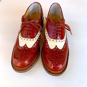 Deep red & white spectators.